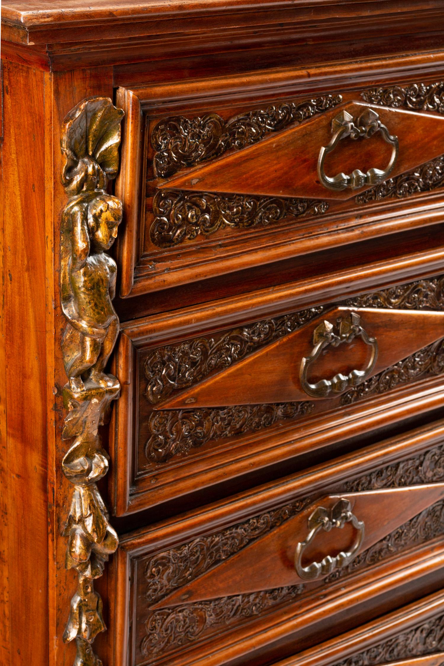 An Italian Baroque Style Walnut Chest of Drawers