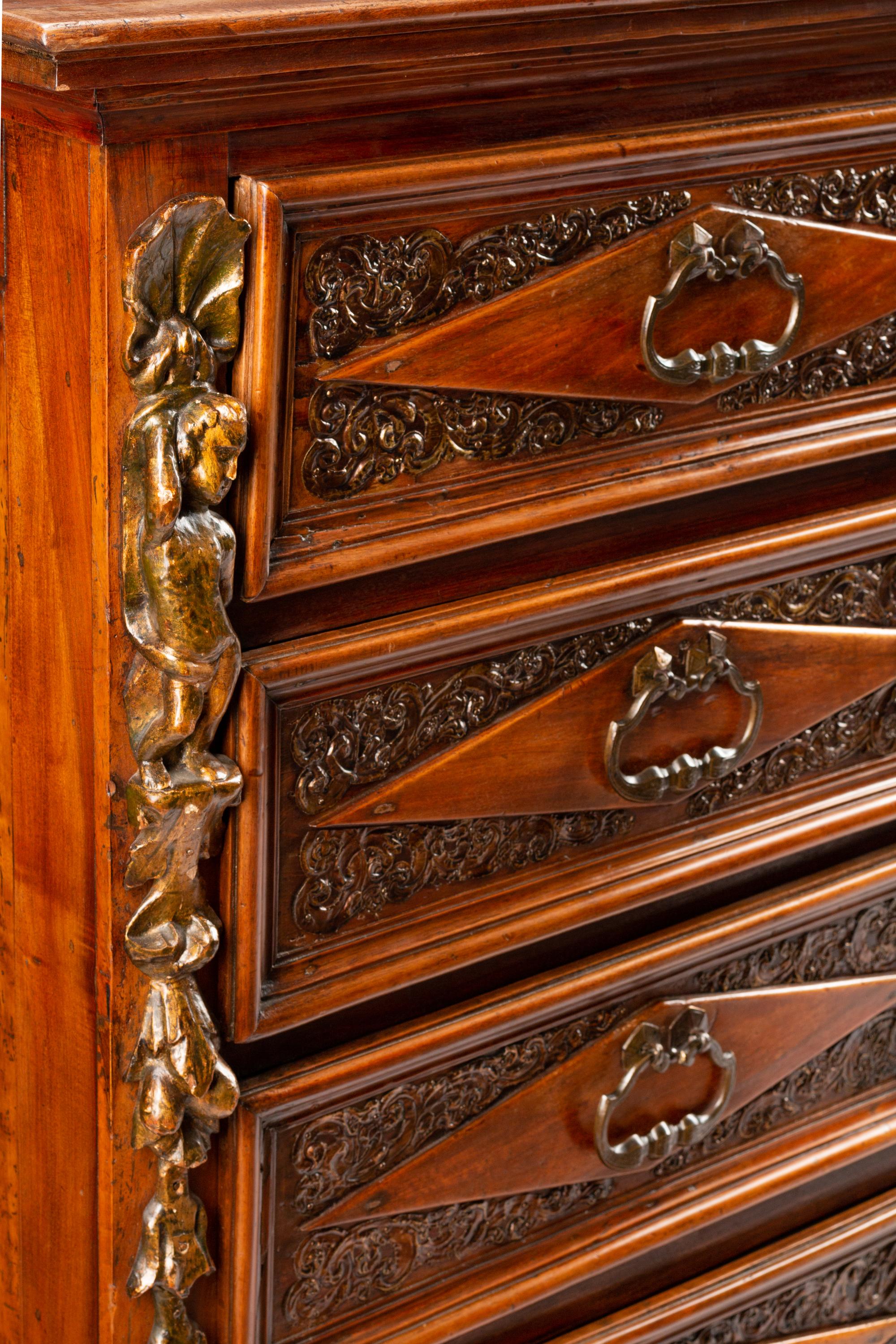An Italian Baroque Style Walnut Chest of Drawers