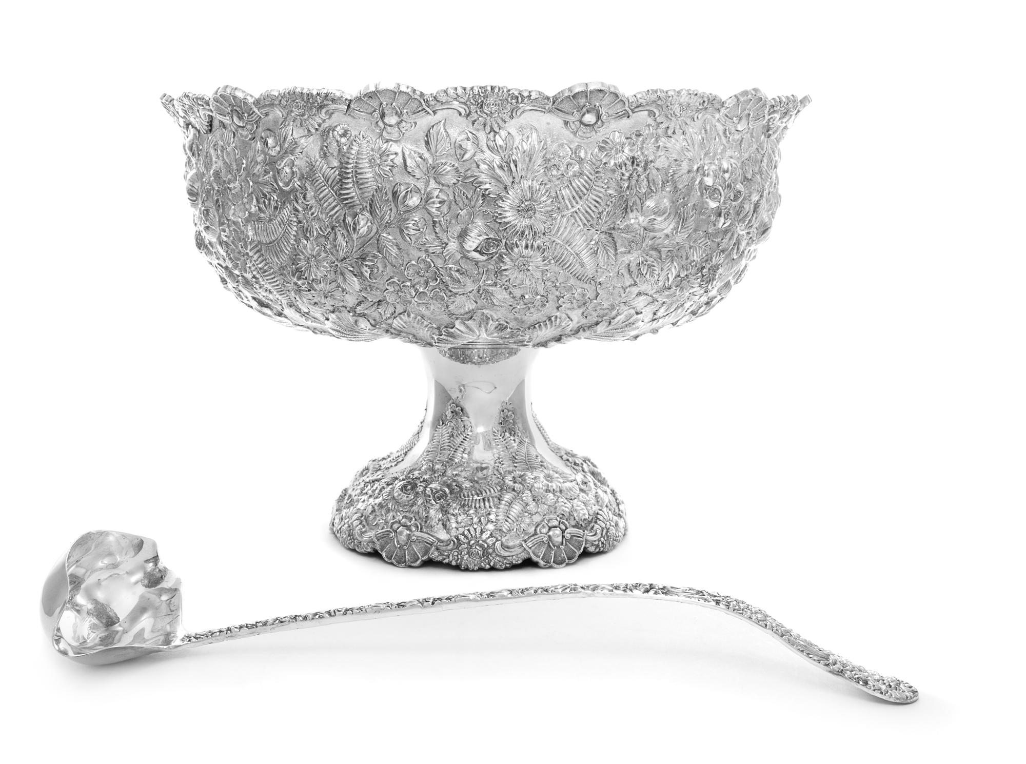 An American Silver Punch Bowl, James R. Armiger Co., Baltimore, MD, the body with repousee floral and foliate decoration throughout, ra
