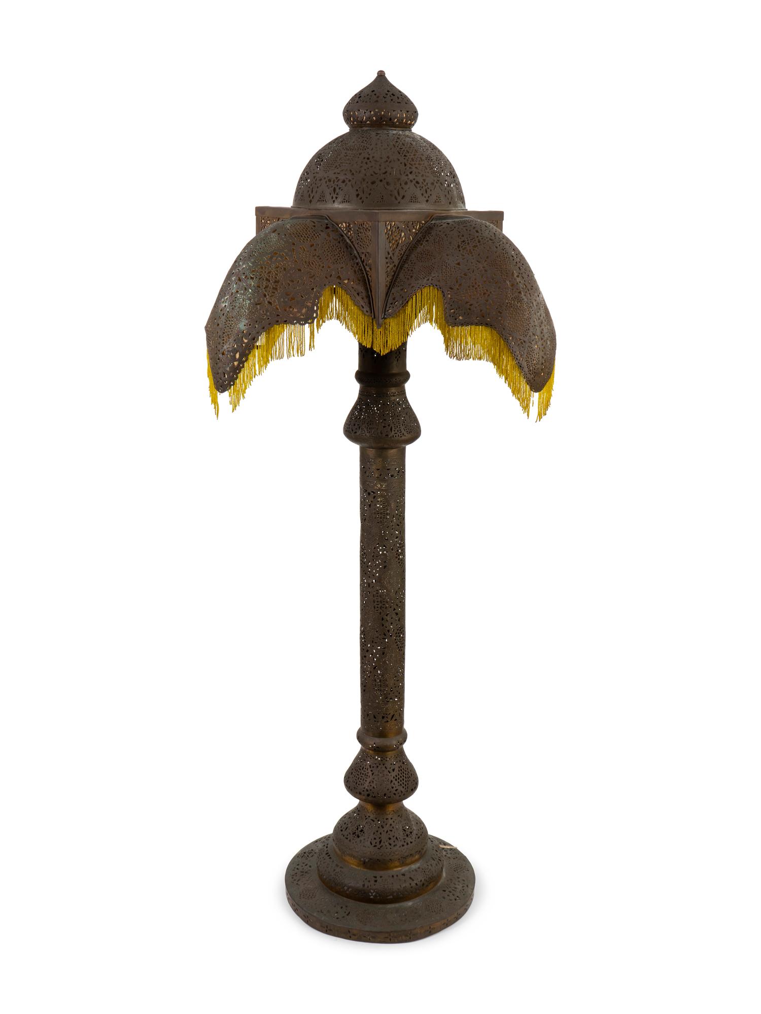 A Moroccan Pierced Brass Floor Lamp with Beaded Fringe Shade — 20TH CENTURY