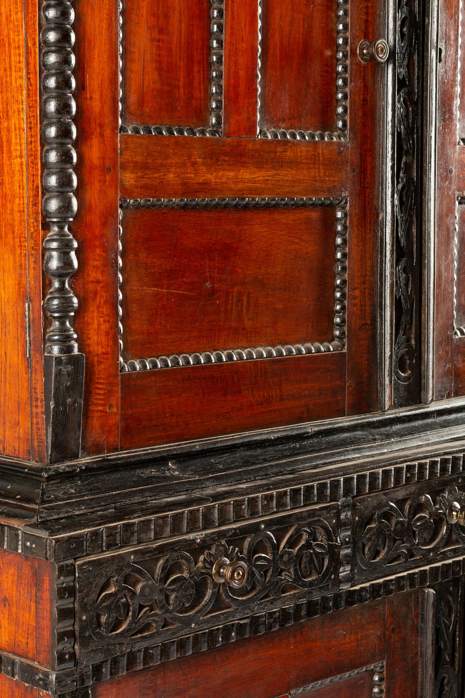 A Dutch Colonial Parcel Ebonized Mahogany Cabinet