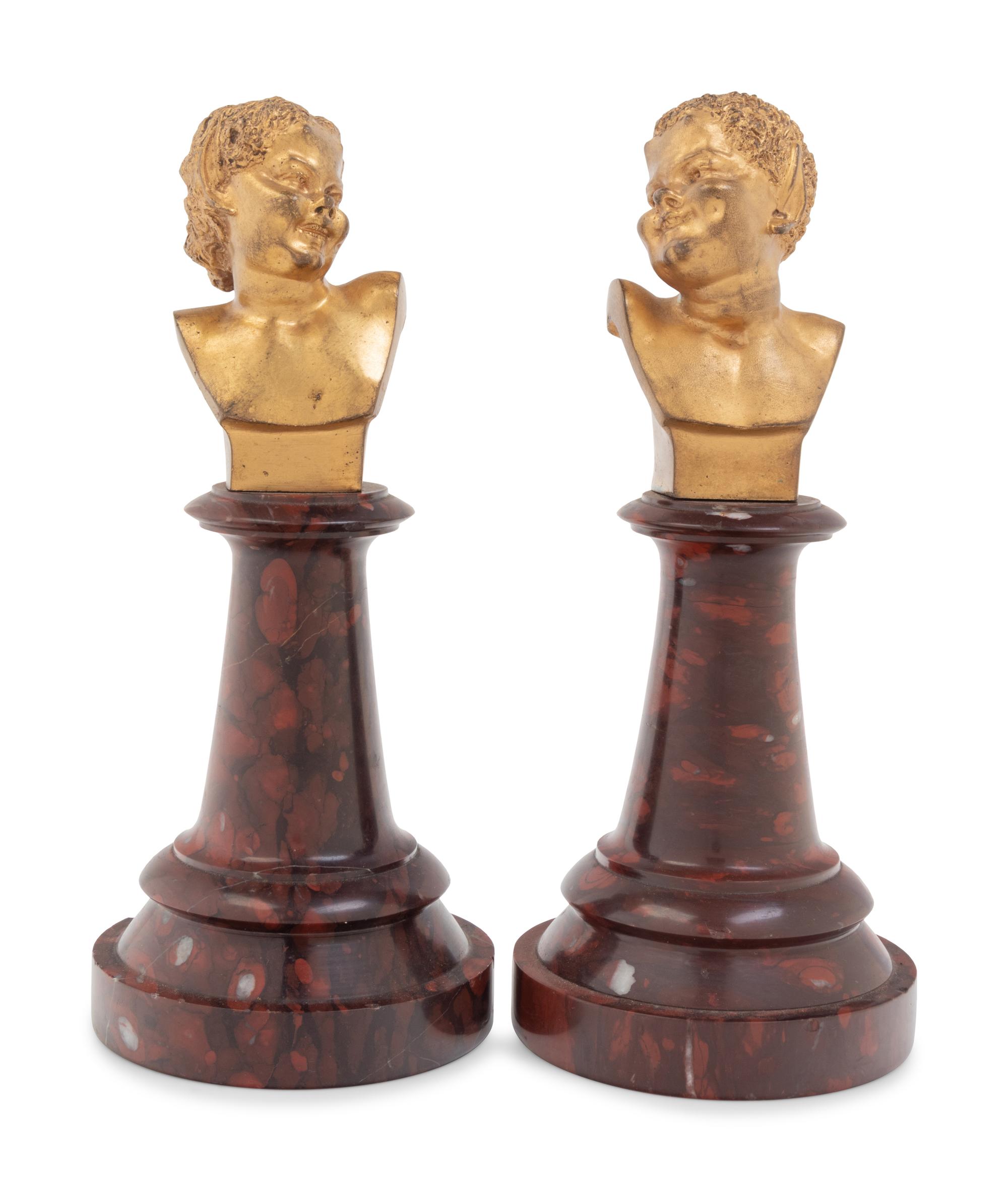 A Pair of French Gilt Bronze and Marble Busts