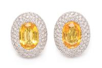 A Pair of 18 Karat White Gold, Yellow Sapphire and Diamond Earclips, Michele della Valle, 18.80 dwts.