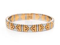 BVLGARI, YELLOW GOLD AND STEEL 'PARENTESI' CUFF BRACELET