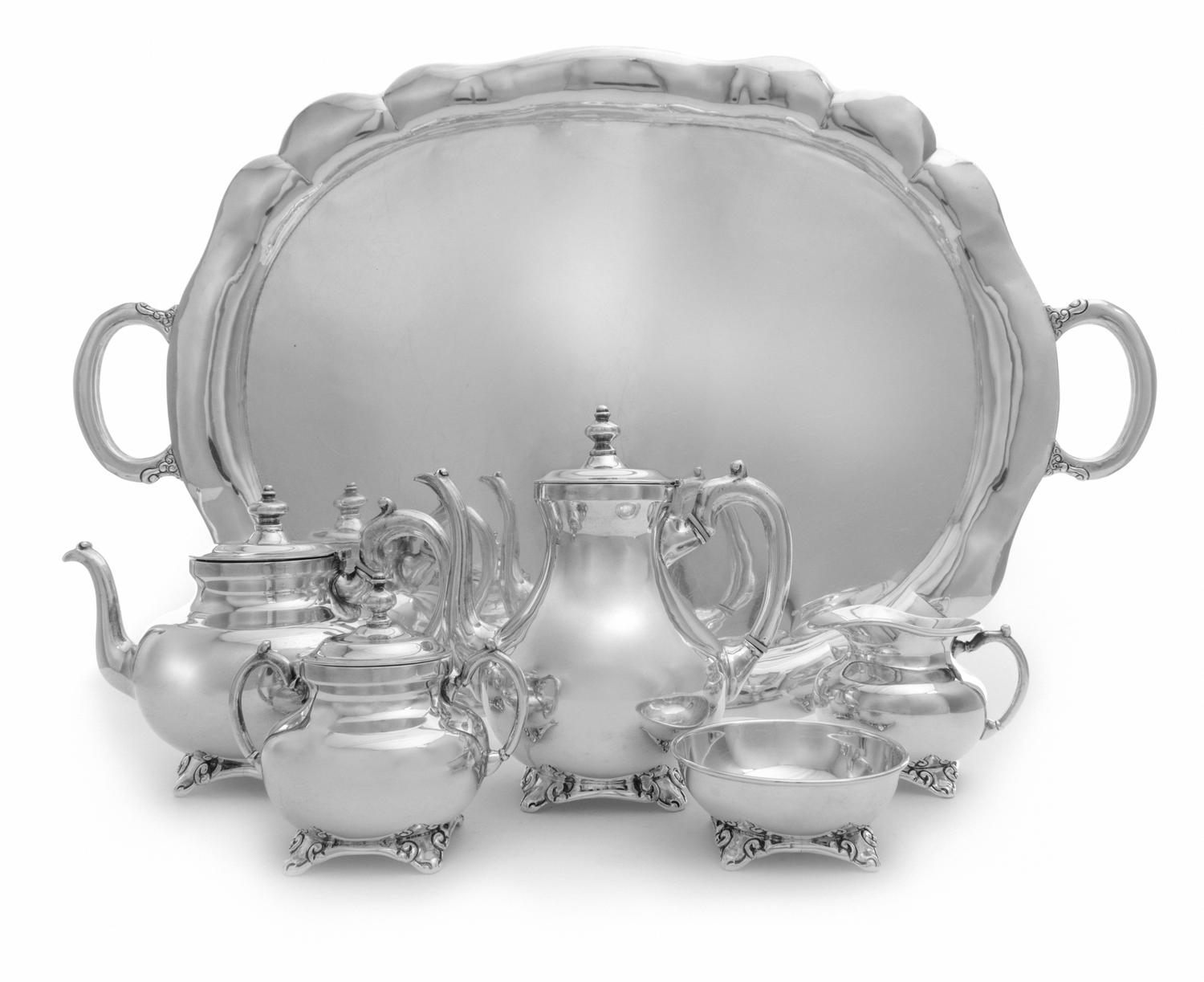 A Mexican Silver Six-Piece Tea and Coffee Service, C. Zurita, Taxco, 20th Century, comprising a teapot, coffee pot, creamer, sugar, was