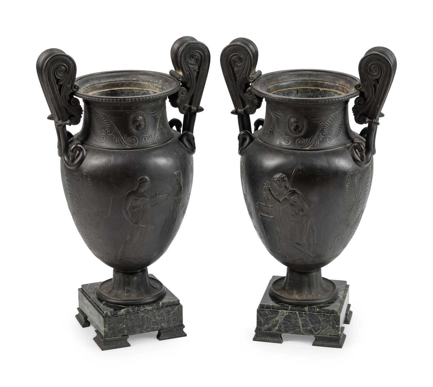 A Pair of Grand Tour Patinated Metal Urns on Marble Bases