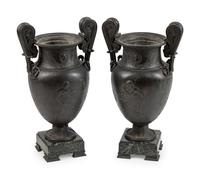 A Pair of Grand Tour Patinated Metal Urns on Marble Bases