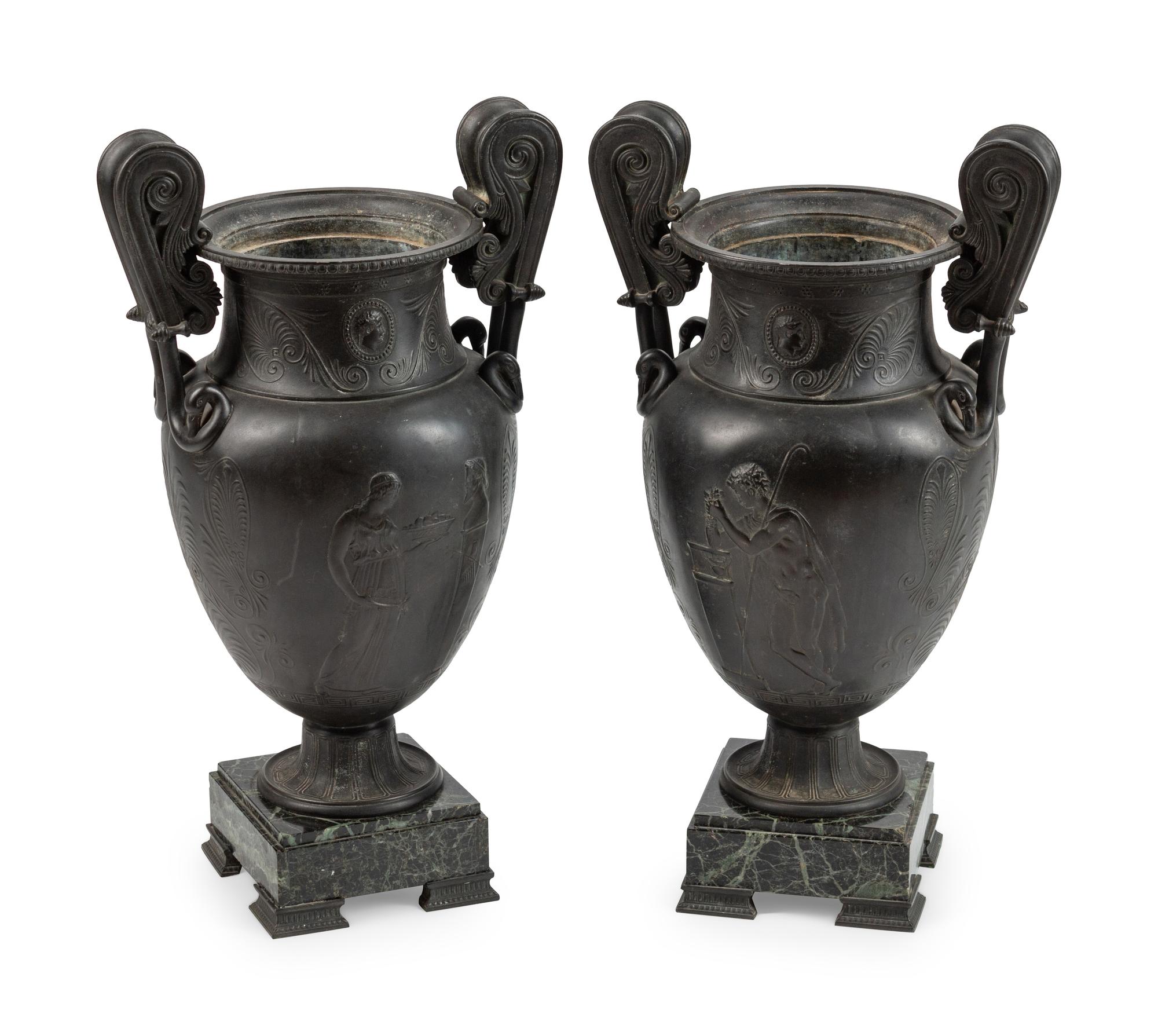 A Pair of Grand Tour Patinated Metal Urns on Marble Bases