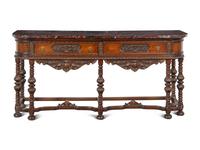 An Italian Carved Walnut Marble-Top Server