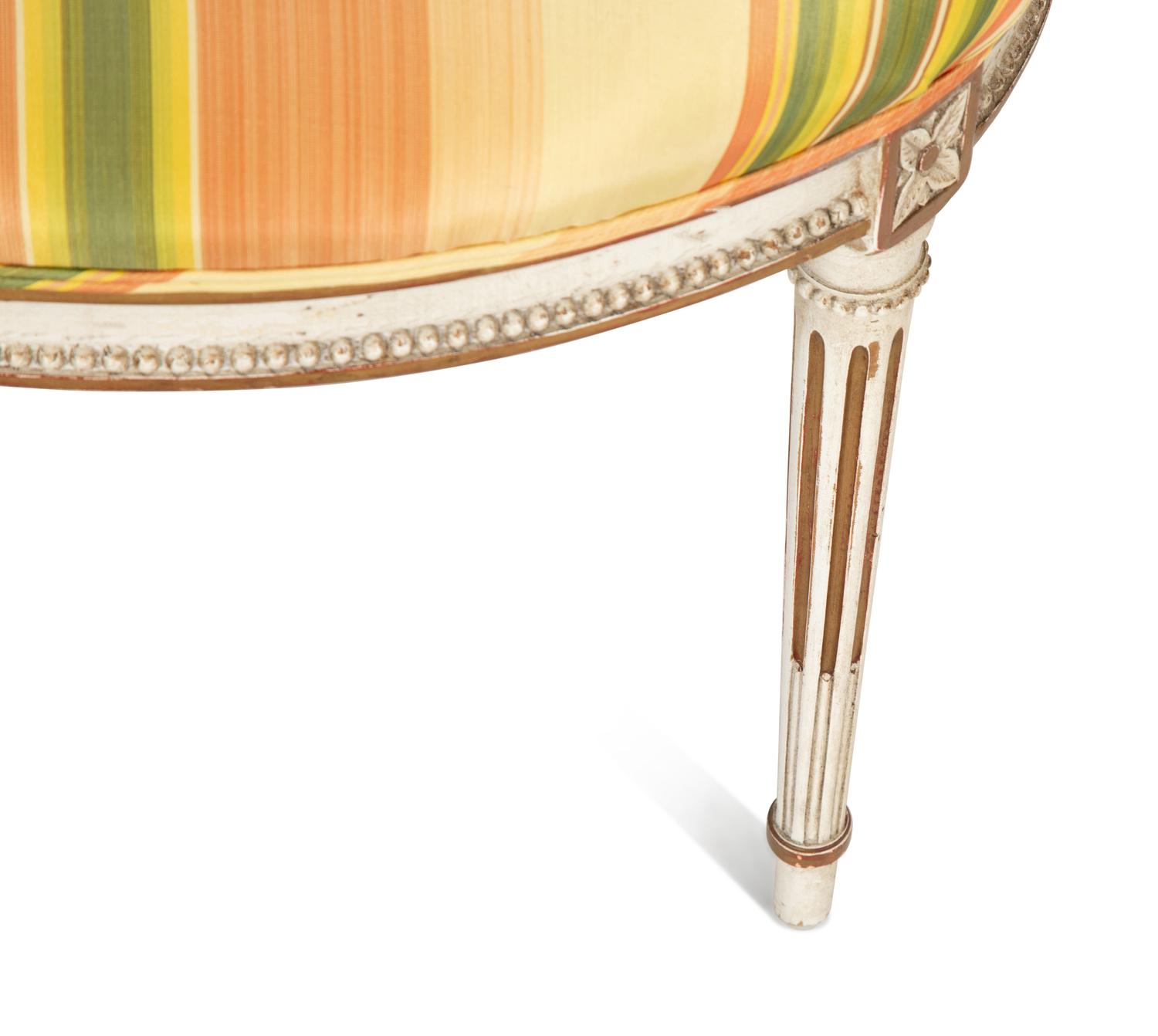 A Continental Painted and Parcel Gilt Fauteuil