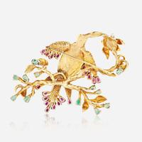 An 18K Yellow Gold and Gemstone Brooch