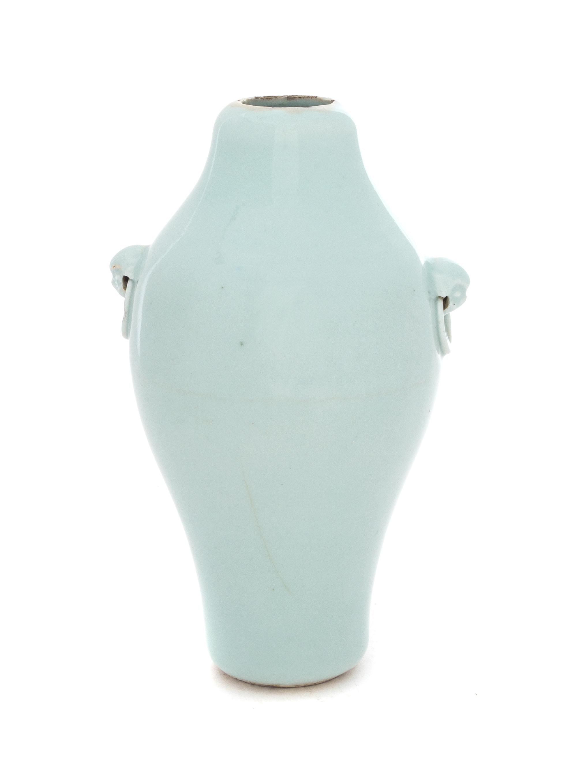 A Celadon Glazed Porcelain Vase Height 8 inches.