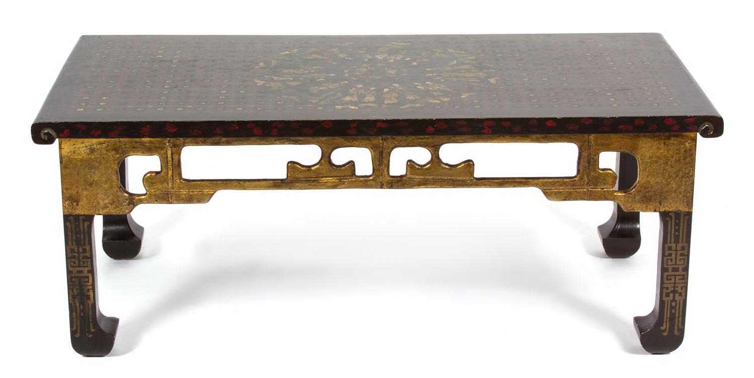 A Chinese Black Lacquer and Gilt Painted Low Table Height 20 x width 52 x depth 25 1/2 inches. — 20TH CENTURY