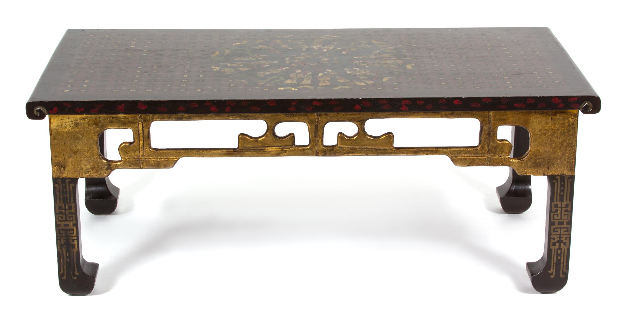 A Chinese Black Lacquer and Gilt Painted Low Table Height 20 x width 52 x depth 25 1/2 inches. — 20TH CENTURY