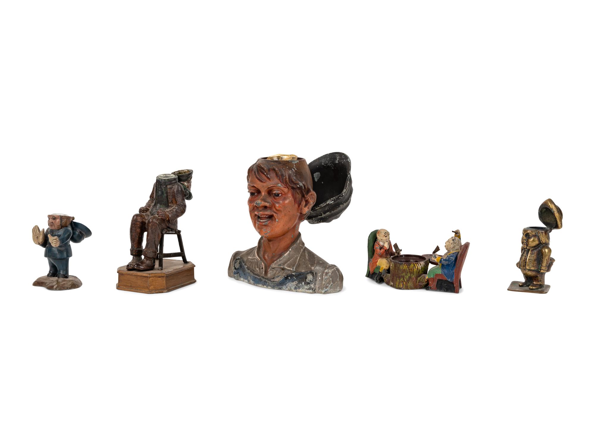 A Group of Five Cast Metal Figural Inkwells