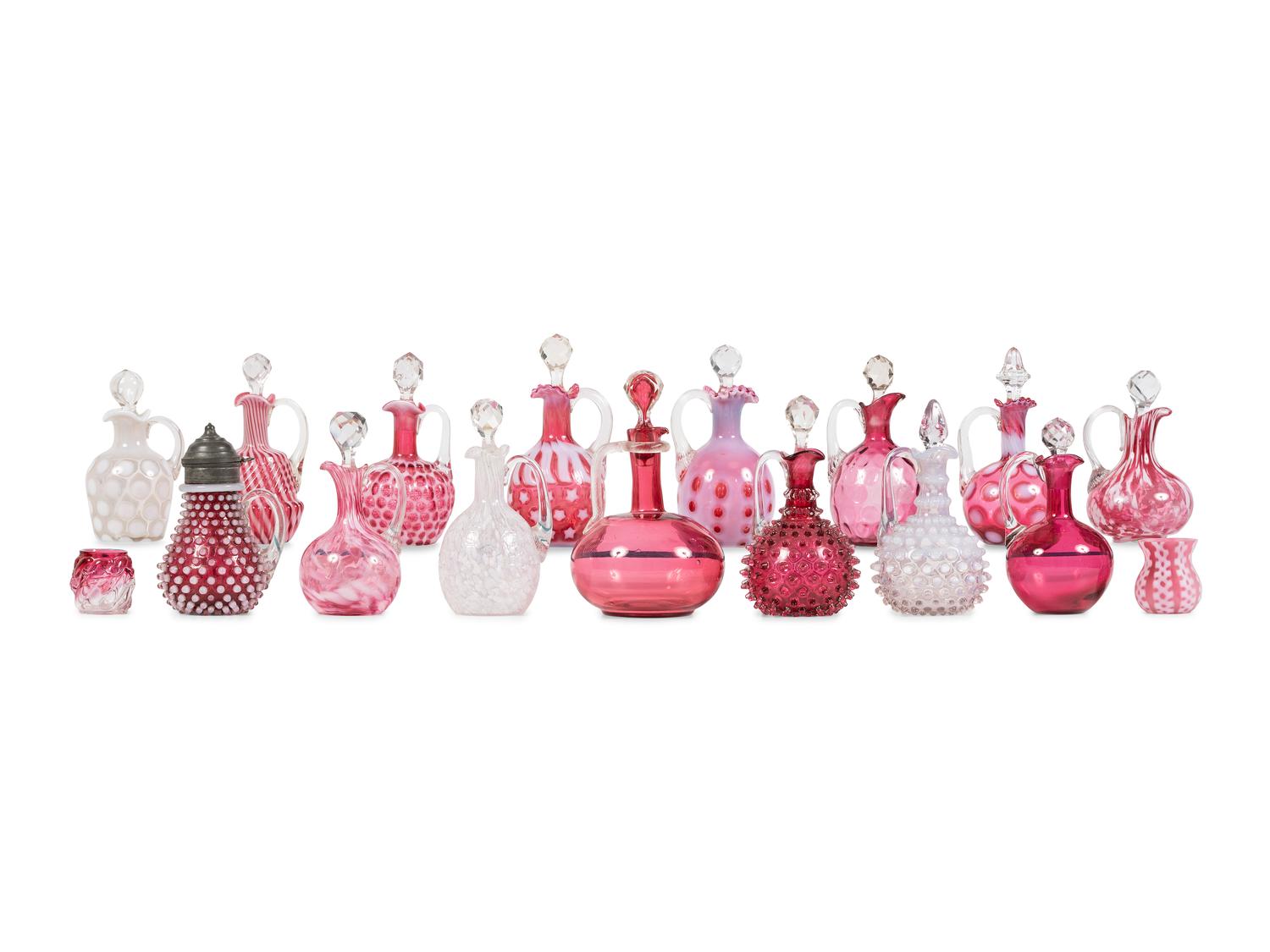 Seventeen Cranberry and Opal Glass Cruets, Toothpick Holders and a Syrup