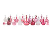 Seventeen Cranberry and Opal Glass Cruets, Toothpick Holders and a Syrup