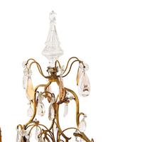 A Pair of French Gilt Metal and Cut Glass Three-Light Girandoles