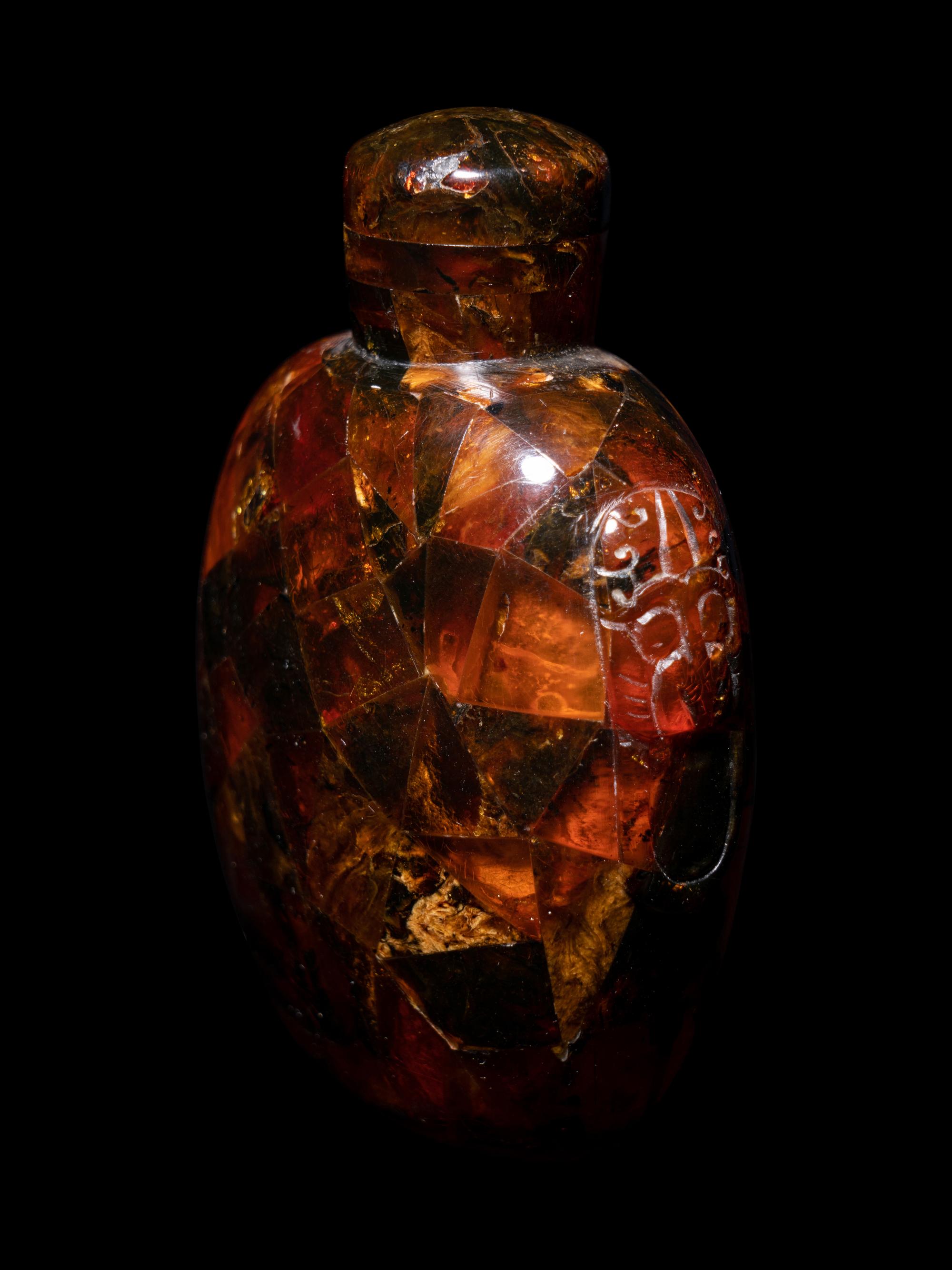 Three Chinese Red Peking Glass Snuff Dishes and A Plastic Imitating Amber Snuff Bottle