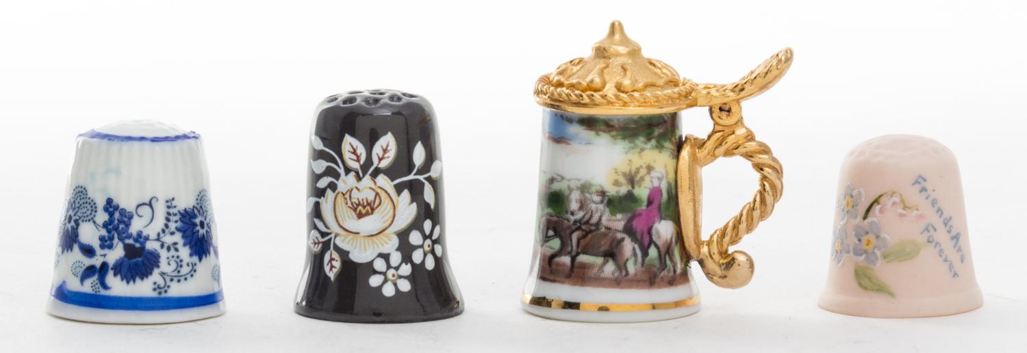 A Collection of Porcelain Thimbles Height of tallest 1 1/2 inches.