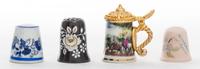 A Collection of Porcelain Thimbles Height of tallest 1 1/2 inches.