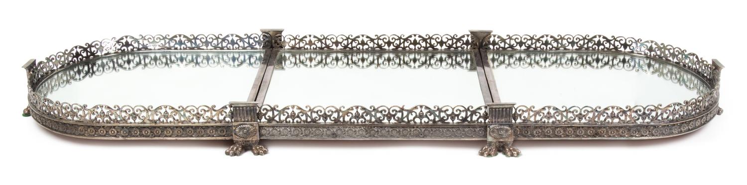 A Silvered Bronze Three-Piece Surtout de Table Height 3 5/8 x width 50 1/2 x depth 17 1/4 inches.