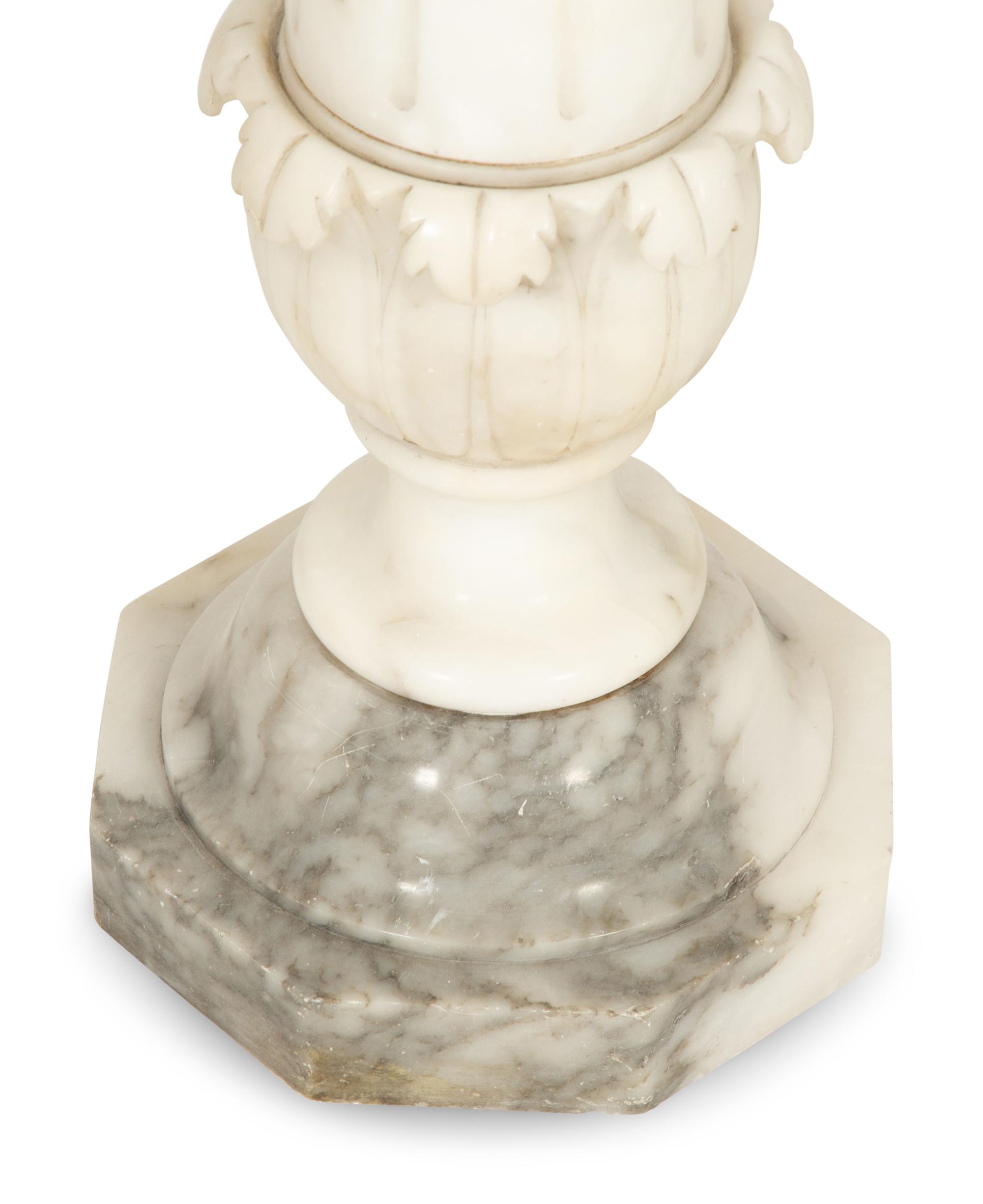 A Carved Alabaster Pedestal