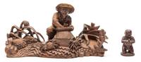A Carved Wood Figure of a Fisherman Height of taller 10 inches.