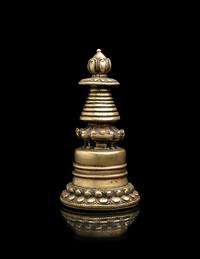 A Small Tibetan Bronze Pala-Style Model of a Stupa
