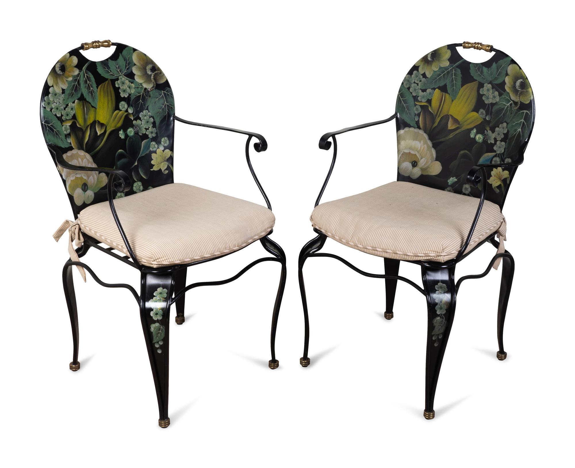 A Pair of Floral Painted Metal Garden Armchairs