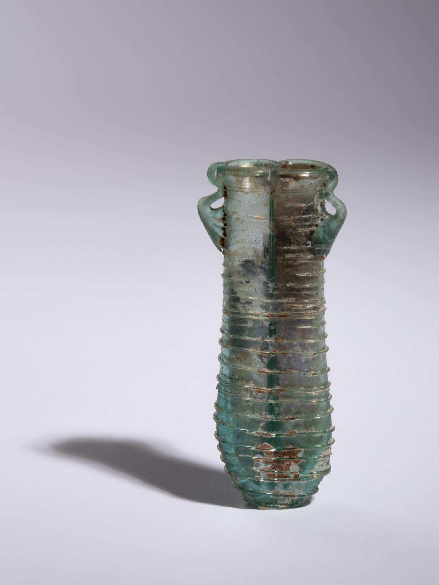 A Roman Glass Double Unguentarium