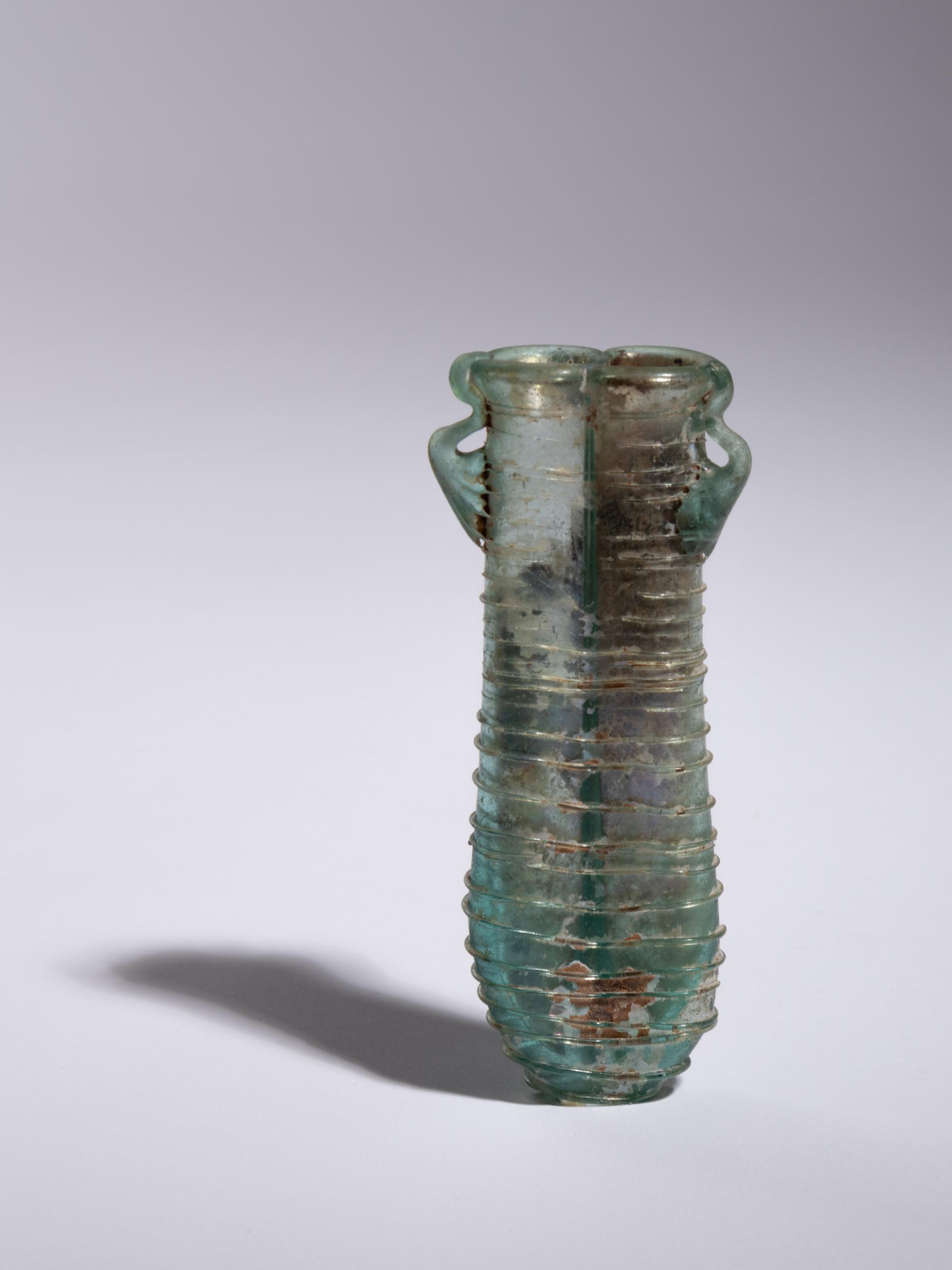 A Roman Glass Double Unguentarium