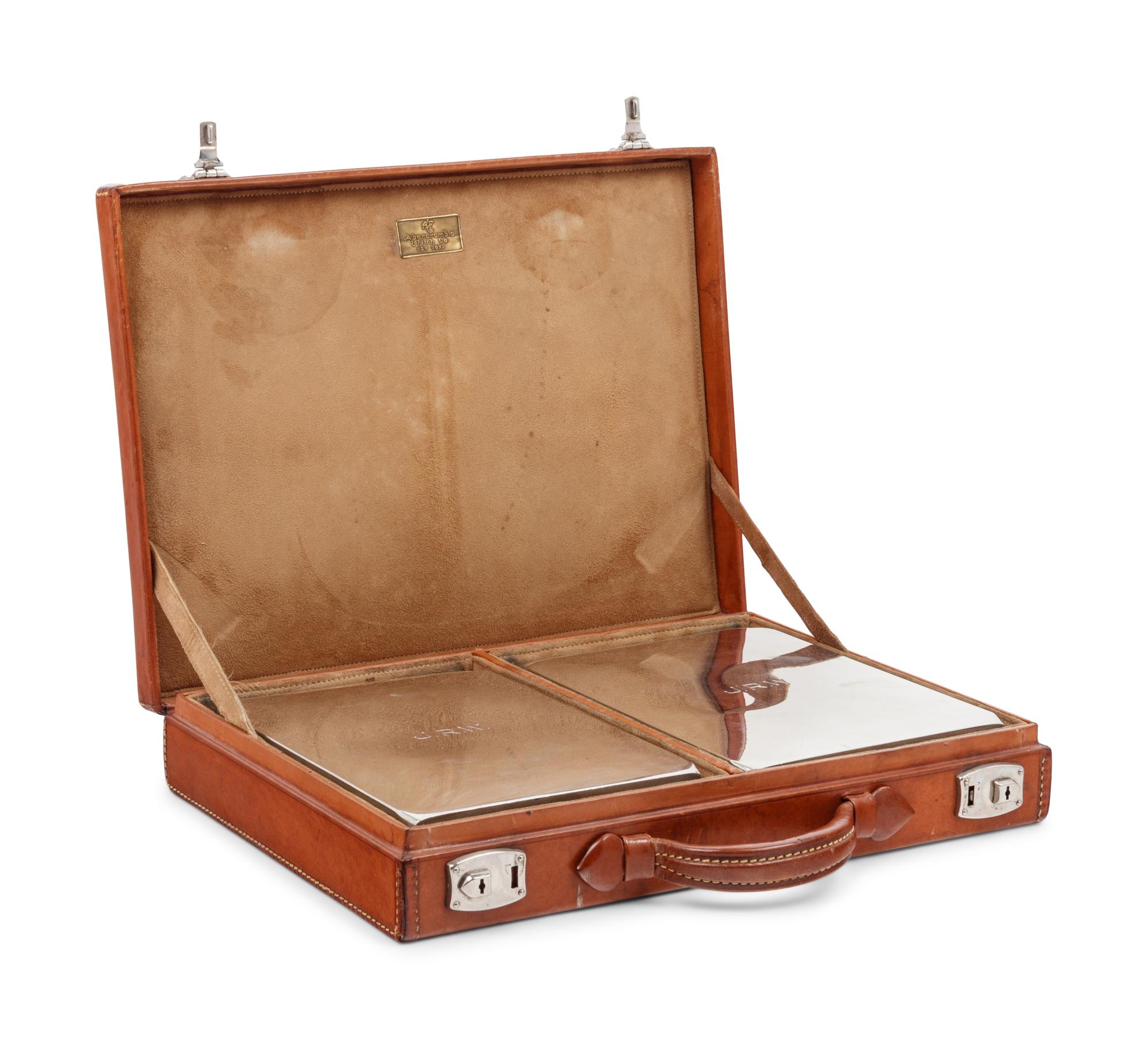 A Leather-Cased Set of Silver-Plate Flasks Retailed by Abercrombie & Fitch