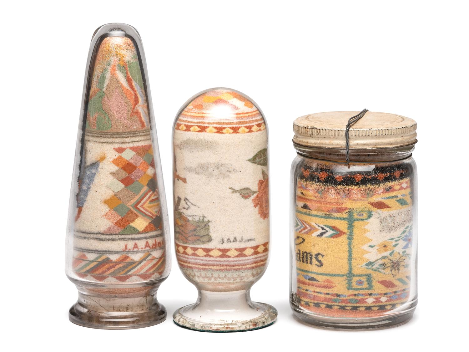 A Collection of John A. Adams Sand Art Bottles, Along with Custom Box and Unused Bottle