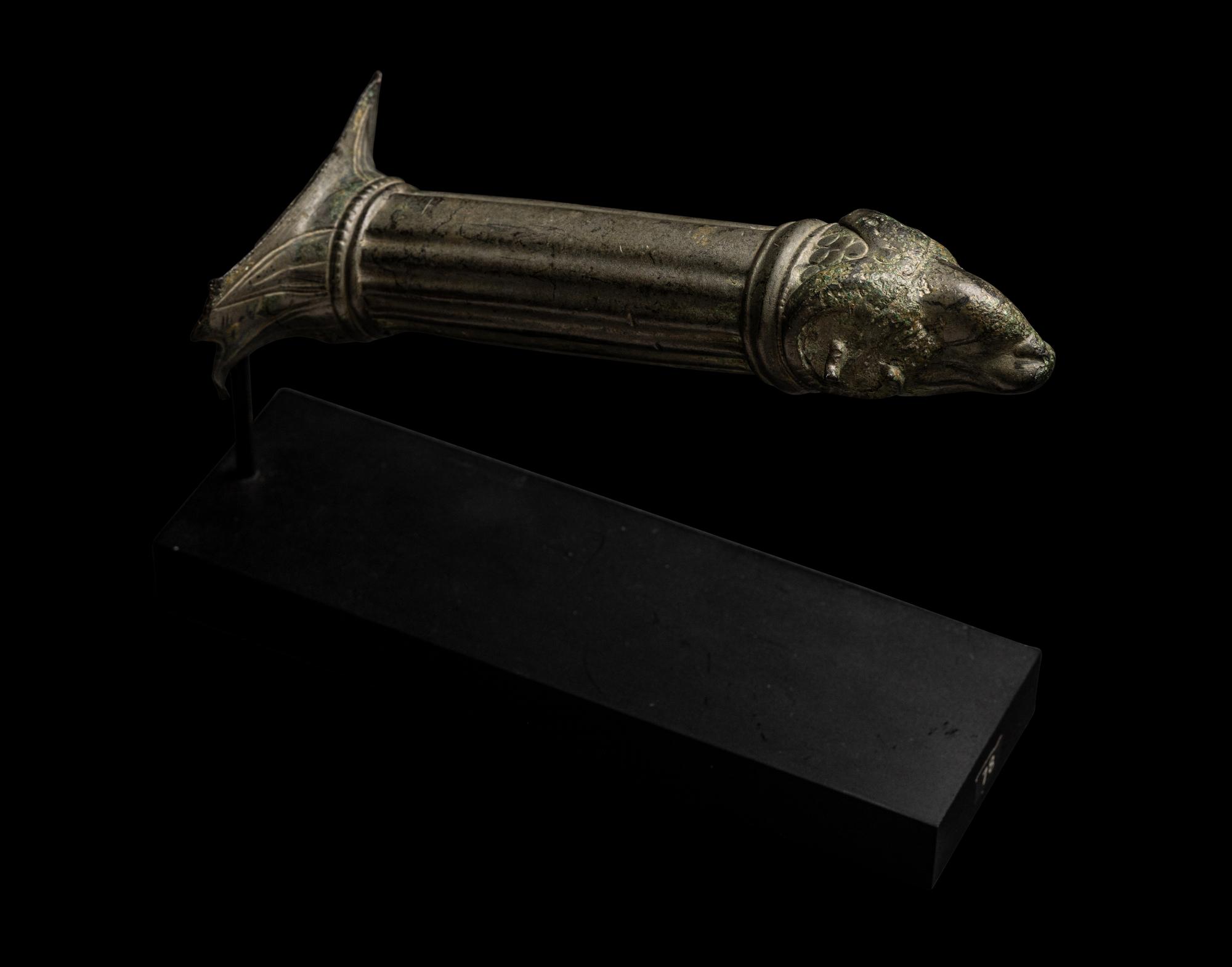 A Roman Bronze Handle with a Ram's Head