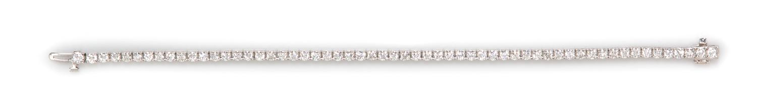 A 14 Karat White Gold and Diamond Line Bracelet, 6.30 dwts.