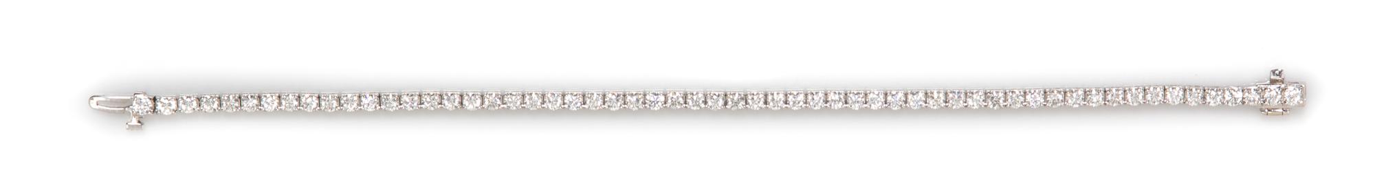 A 14 Karat White Gold and Diamond Line Bracelet, 6.30 dwts.