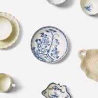 An assorted group of twenty-eight English soft paste porcelain and salt-glazed stoneware tablewares Various makers, 18th century