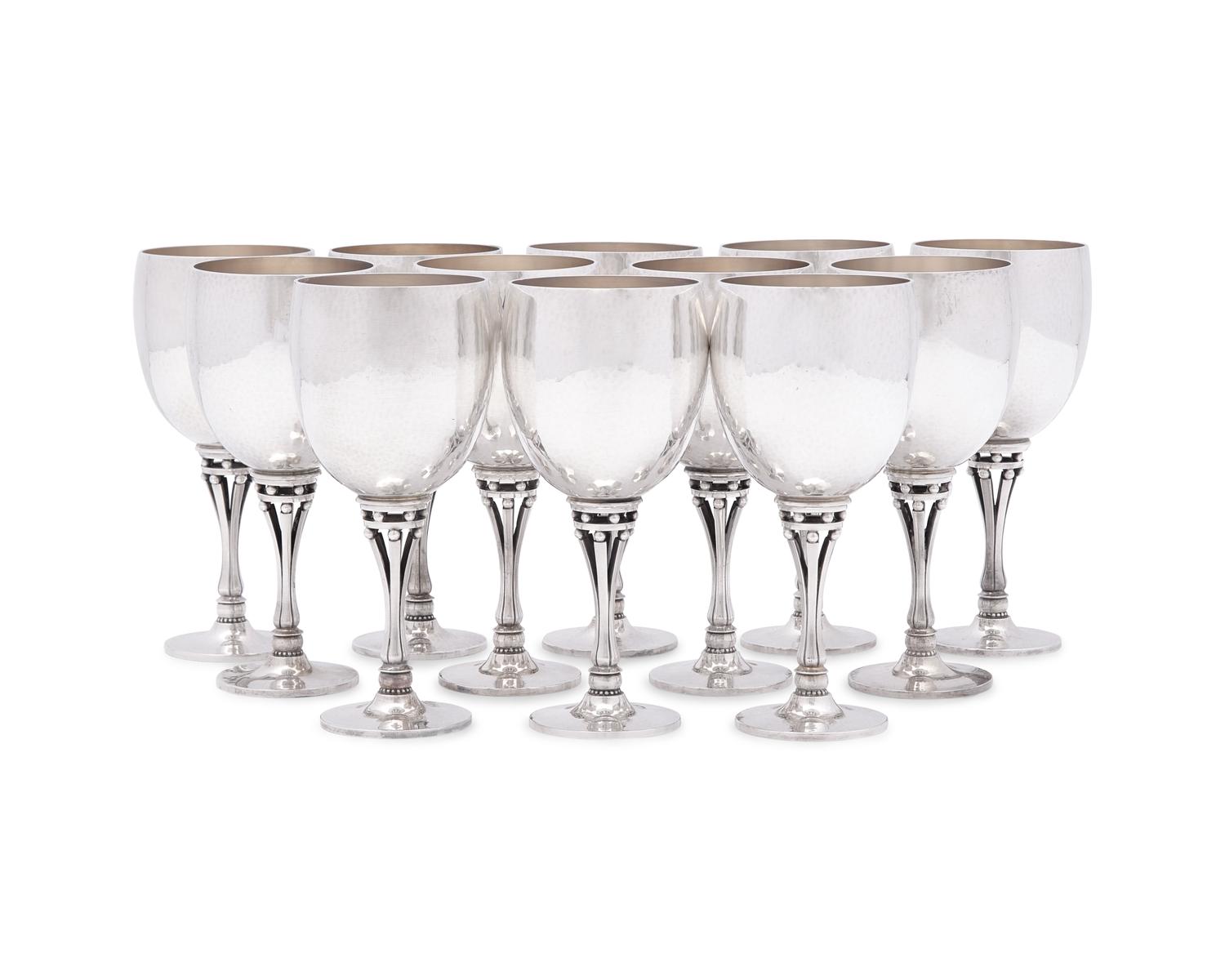 A Set of Twelve Harald Nielsen Designed Georg Jensen Silver Goblets