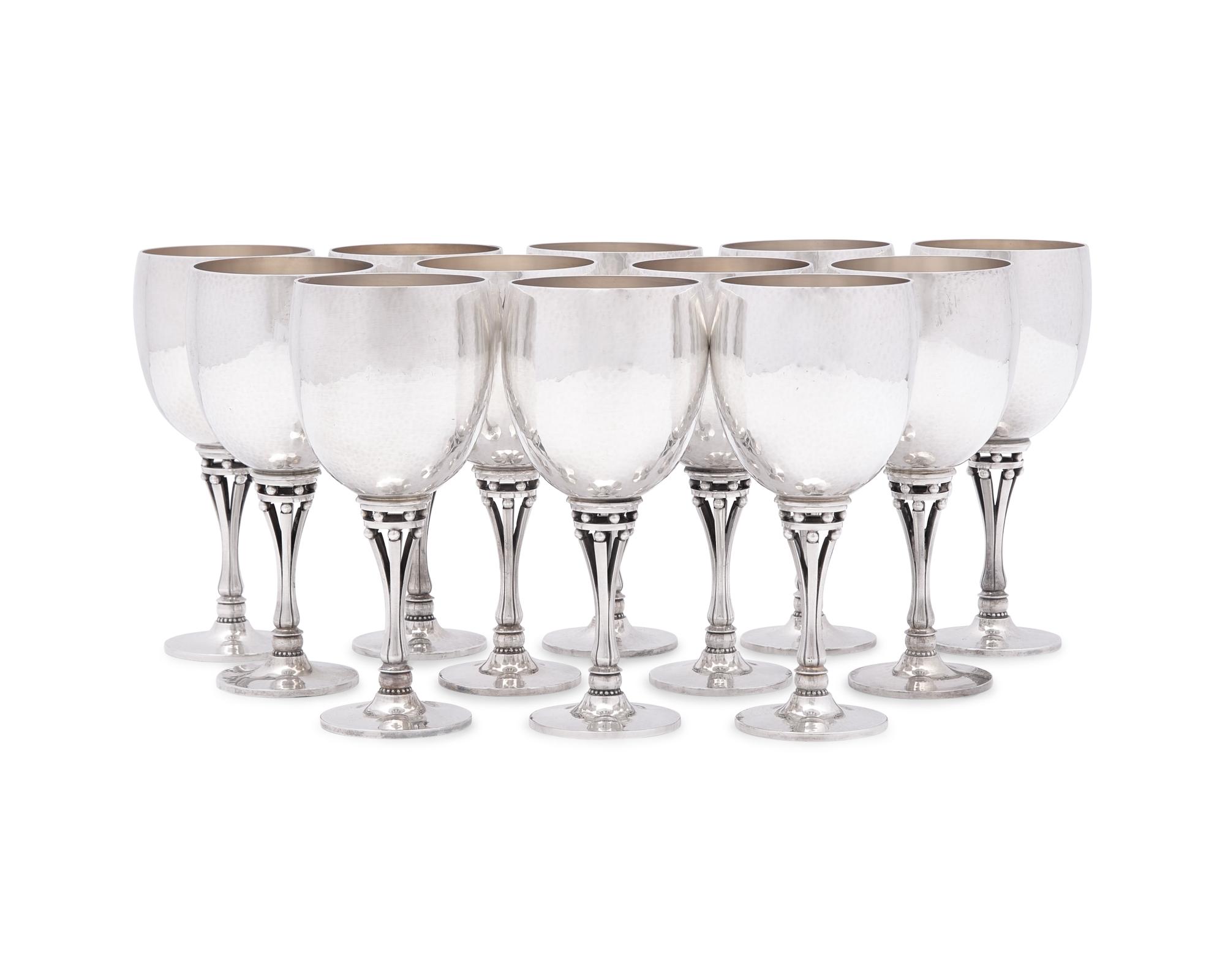 A Set of Twelve Harald Nielsen Designed Georg Jensen Silver Goblets
