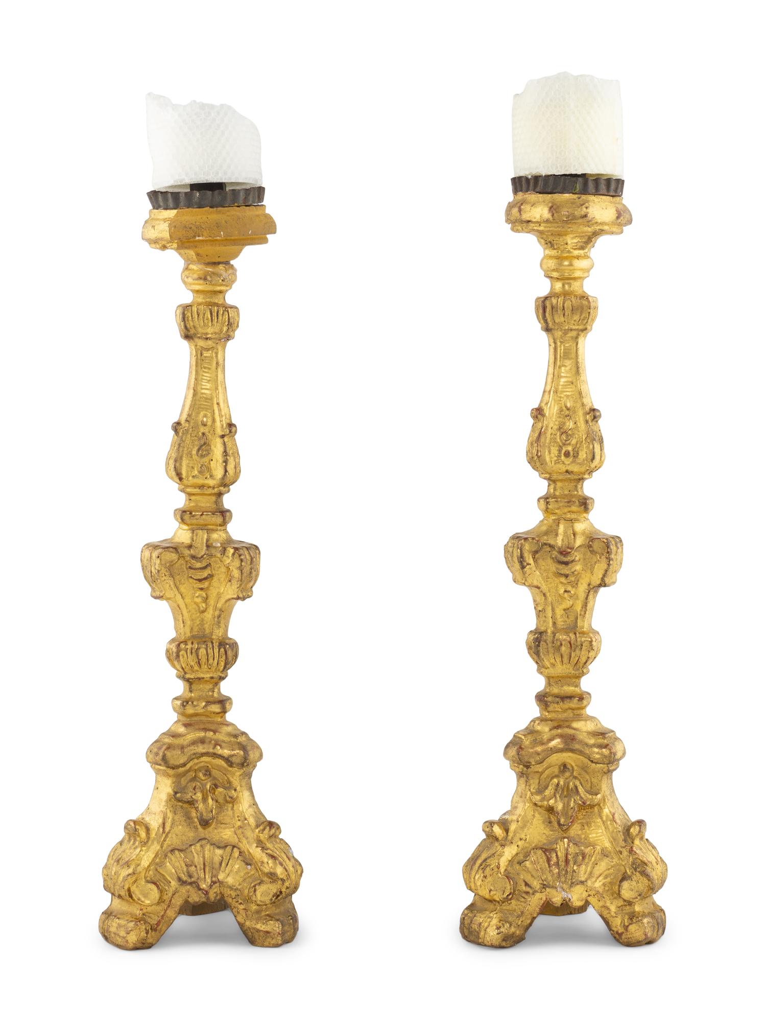 A Pair of Continental Giltwood Prickets