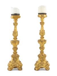 A Pair of Continental Giltwood Prickets