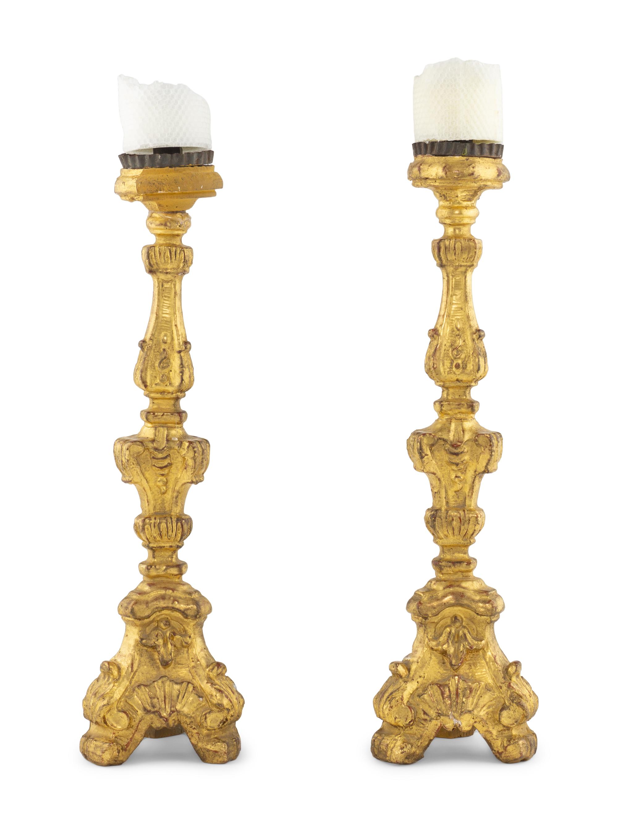 A Pair of Continental Giltwood Prickets