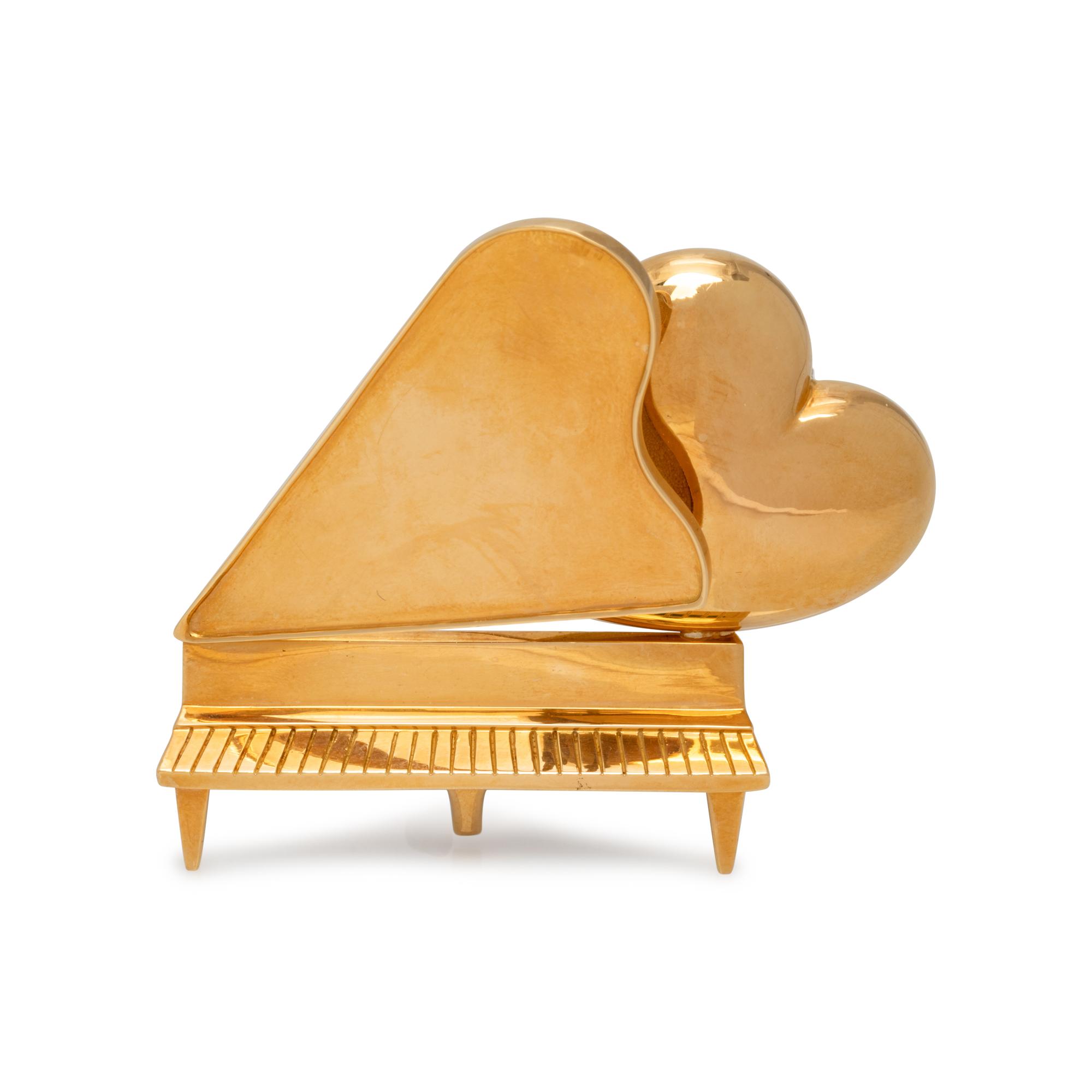 MOVADO, YELLOW GOLD PIANO BROOCH