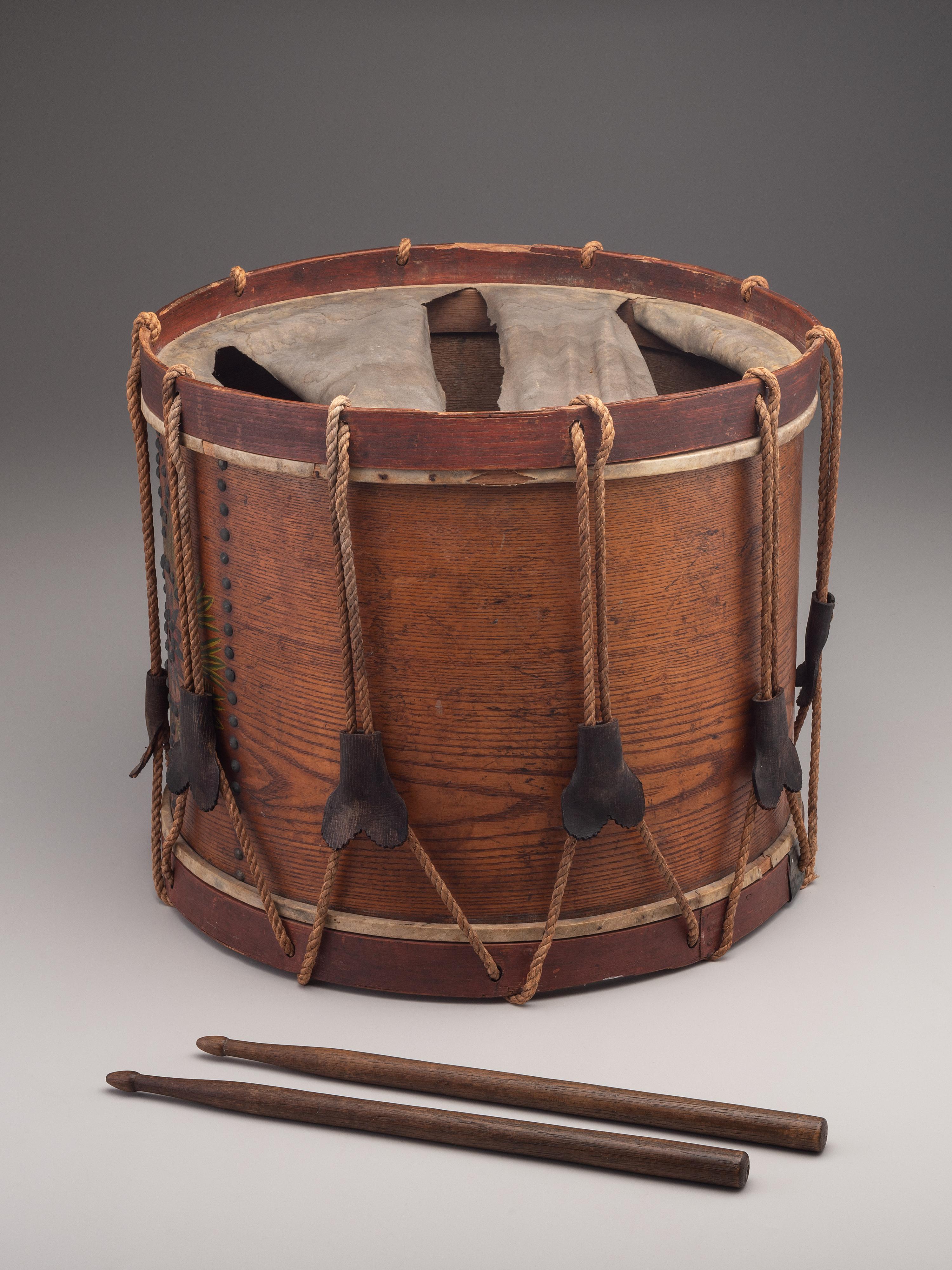 [MILITARIA]. Possibly Mexican War painted drum featuring ornate tack design, with drumsticks.