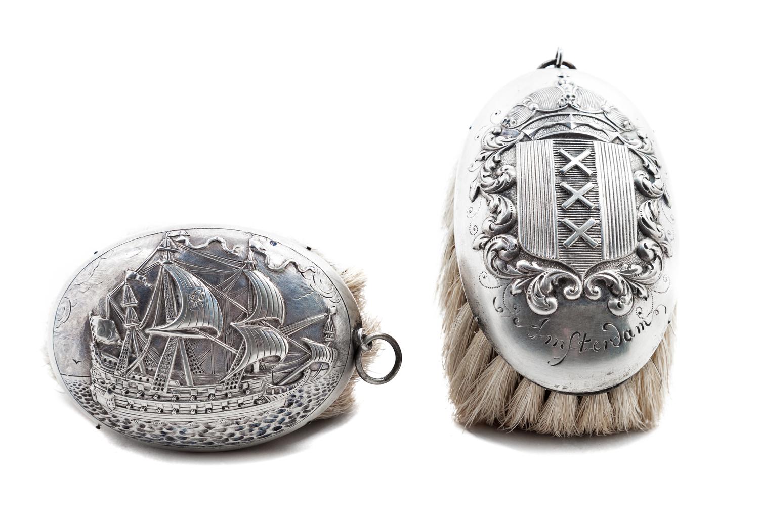 Two Silver-plate Brushes Length of longest 5 inches.