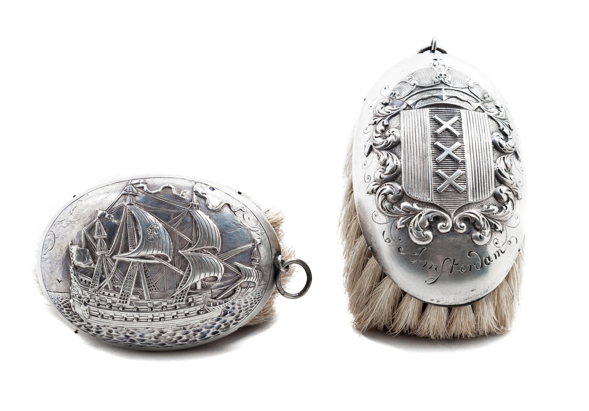 Two Silver-plate Brushes Length of longest 5 inches.