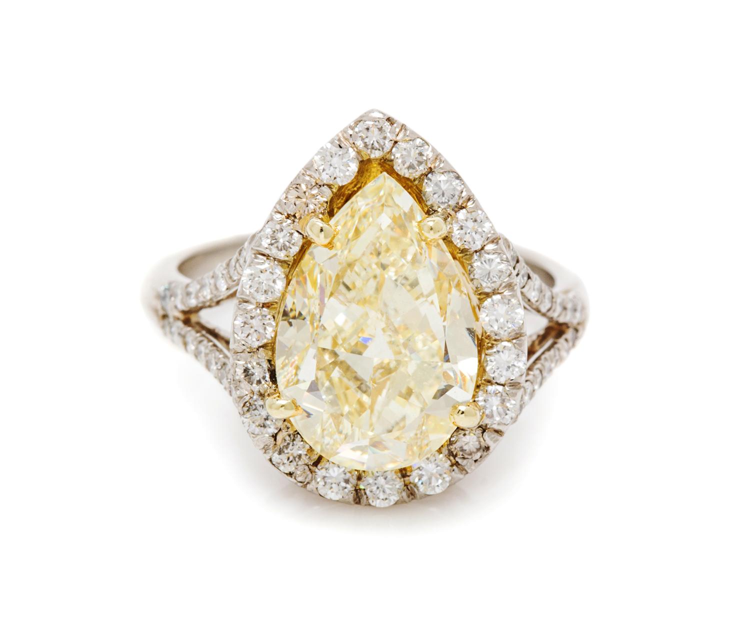 A Platinum, 18 Karat Yellow Gold, Colored Diamond and Diamond Ring, 5.80 dwts.