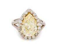 A Platinum, 18 Karat Yellow Gold, Colored Diamond and Diamond Ring, 5.80 dwts.