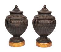 A Pair of Continental Cast Iron Urns